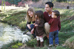 Family by a lake, estate planning concept.